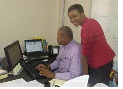 The Honourable V. H. Cornelius de Weever signing the e-petition