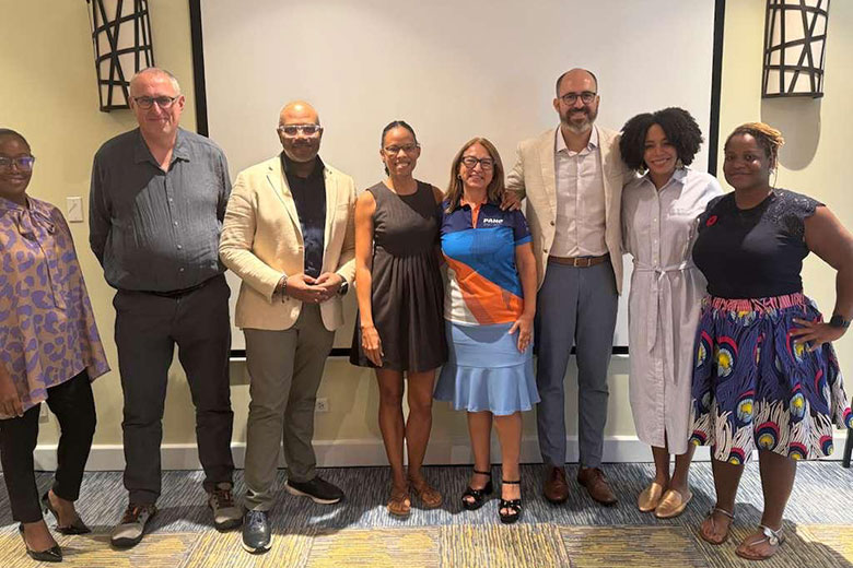 Addressing the Commercial Determinants of NCDs in Caribbean SIDS meeting group photo in a well lit room